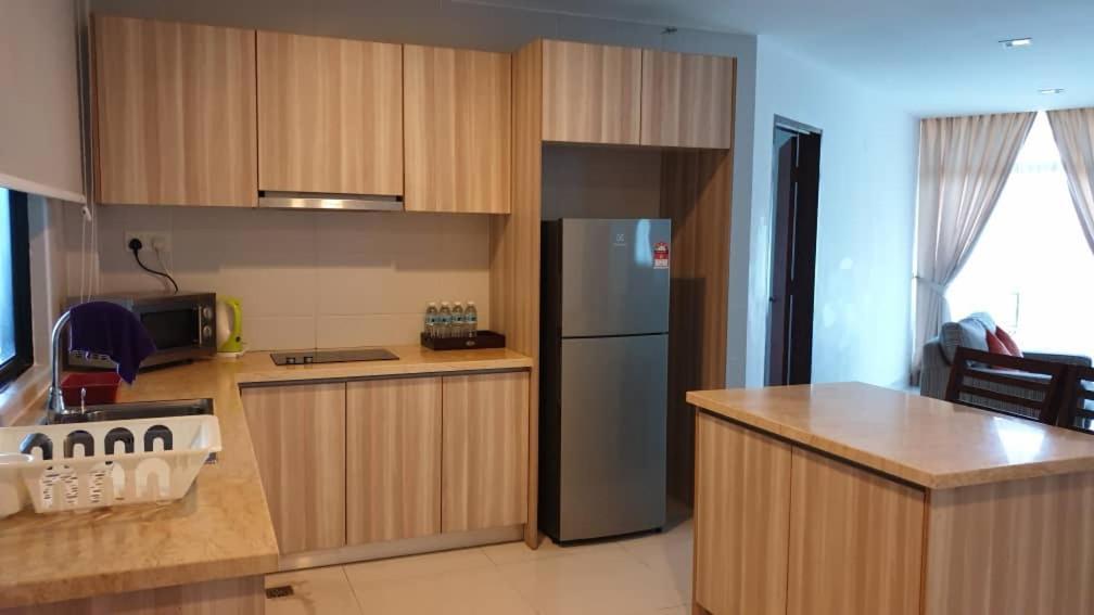 Samsuria Beach Apartment Resort Cherating Bagian luar foto